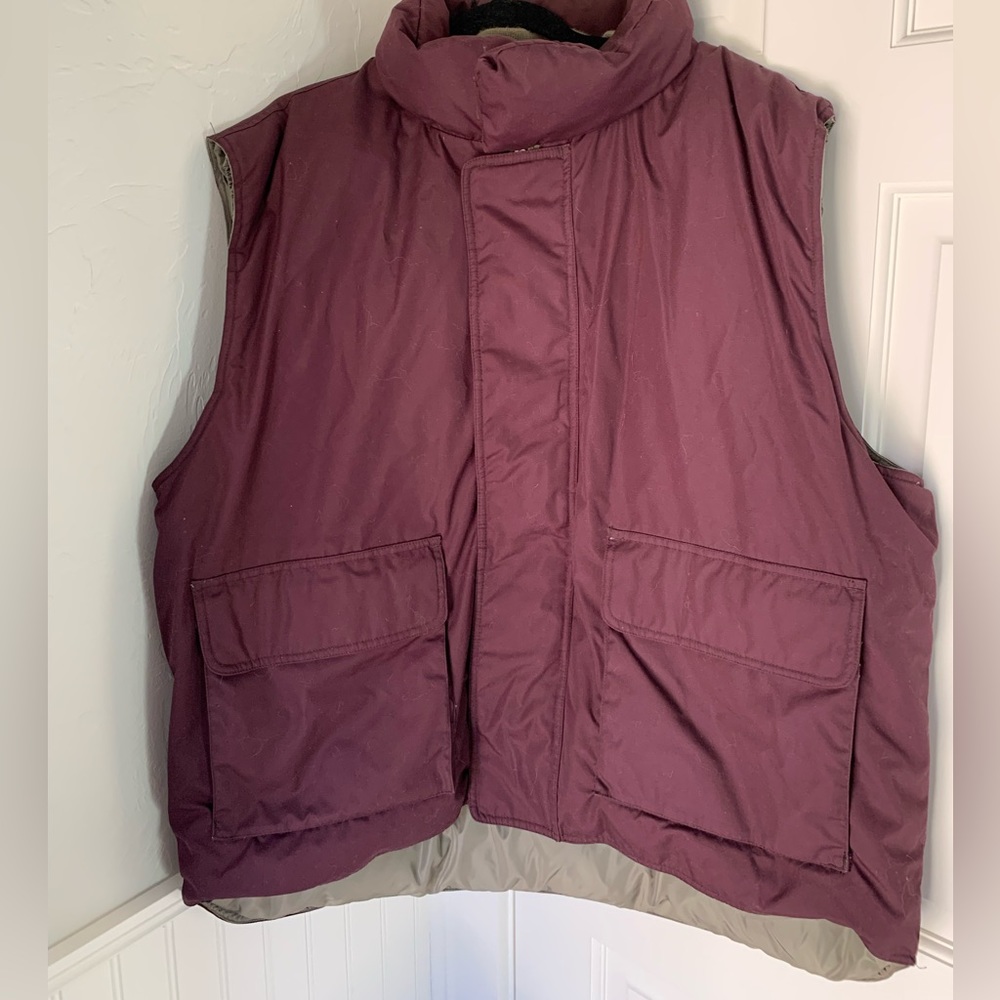 Cabelas Premium Northern Goose Down Vest, gently used. Multiple pockets, so warm